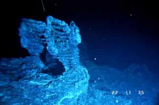 The submerged wreck of the Titanic, showcasing its decayed structure and remnants on the ocean floor.
