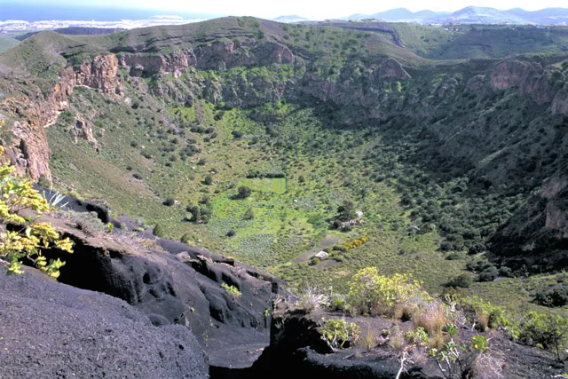 A picturesque view of the green Caldera de Bandama
