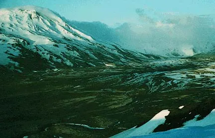 The stunning Griggs Holocene stratovolcano towering in the snowy mountain range.