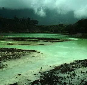 Telaga Warna is a lake within a broad, low-relief cone.