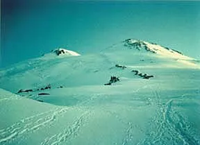 Two snow covered mountains