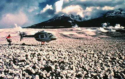 a pumice deposit from a 1980 pyroclastic flow at Mount St. Helens. Note person holding pumice boulder.