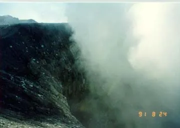 Tokachi's crater covered in a cloud of white smoke