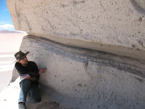 Image of the co-ignimbrite ash deposit with Bob for scale.