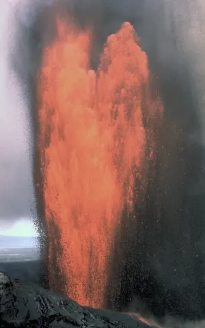 Lava shooting upward from a Hawaiian volcano