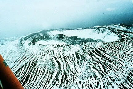 Two connected cones with independent craters at their summits